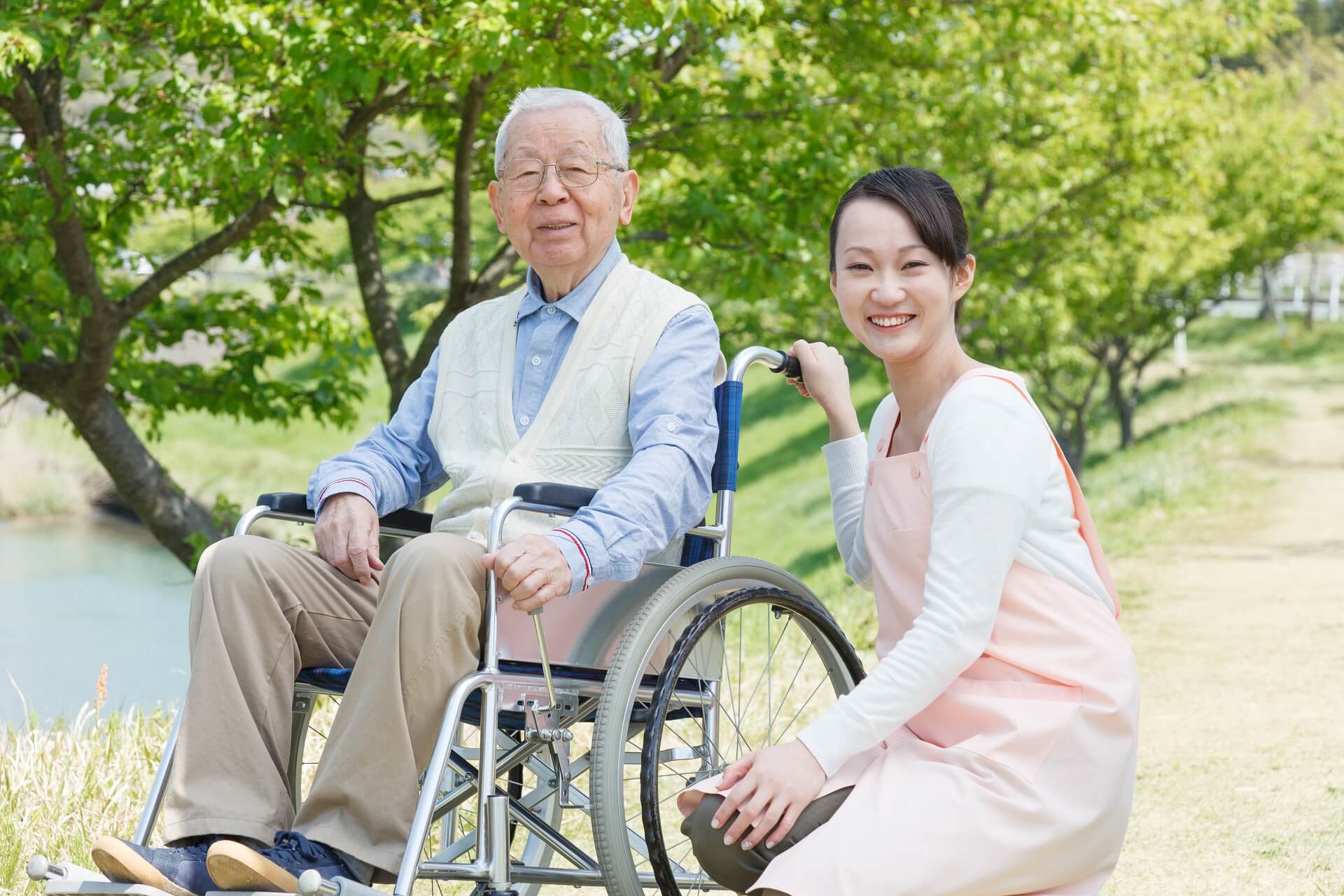 Professional Asian caregiver providing compassionate elderly care services